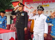 Kapolsek Pelawan Singkut Irup Penurunan Bendera HUT RI ke 79 Tahun 2024