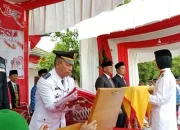 Upacara Pengibaran Bendera Merah Putih di Kecamatan Singkut Berlangsung Sukses dan Meriah